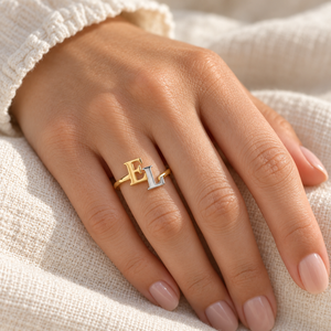 Interlocking Initial Ring — worn styling view; example personalization shown