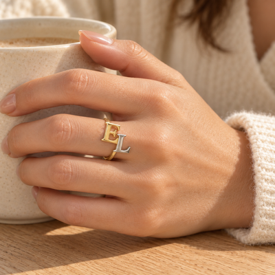 Interlocking Initial Ring — lifestyle styling view; example personalization shown