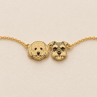 Golden personalised pet portrait bracelet with two example dog portraits on an ivory background